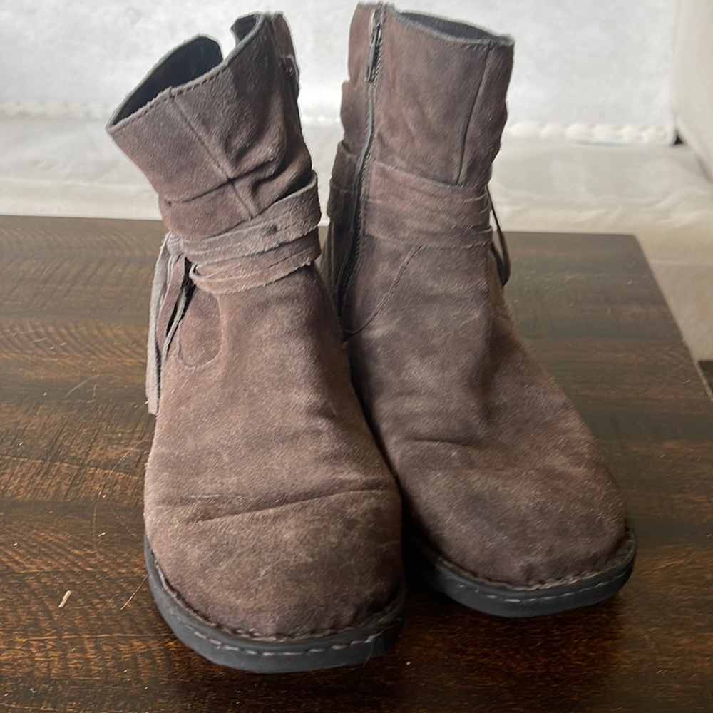 Born Size 9 low calf boot. Worn a handful of times.